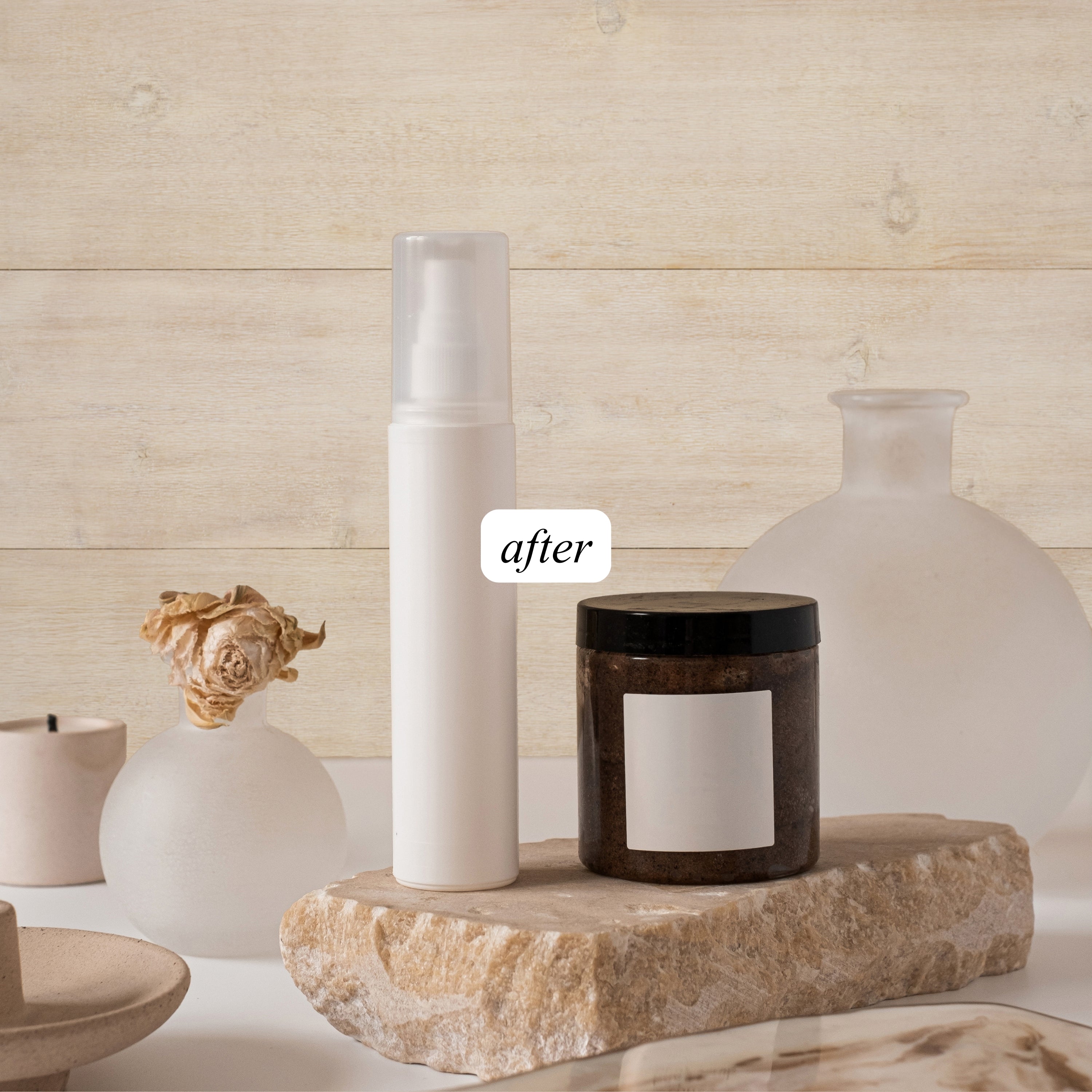 Beauty still life photograph of cosmetic bottle and jar on a stone surface with a weathered planked wooden background 