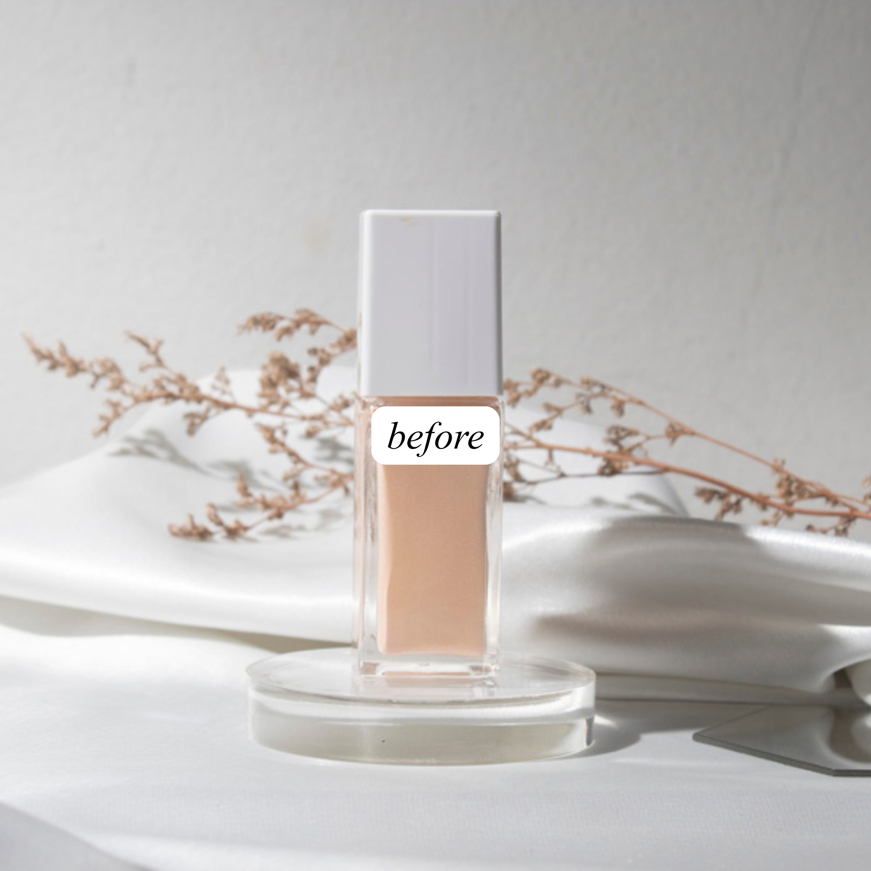 Cosmetic beauty product photography with branch, fabric, plain white background. Labeled "before".