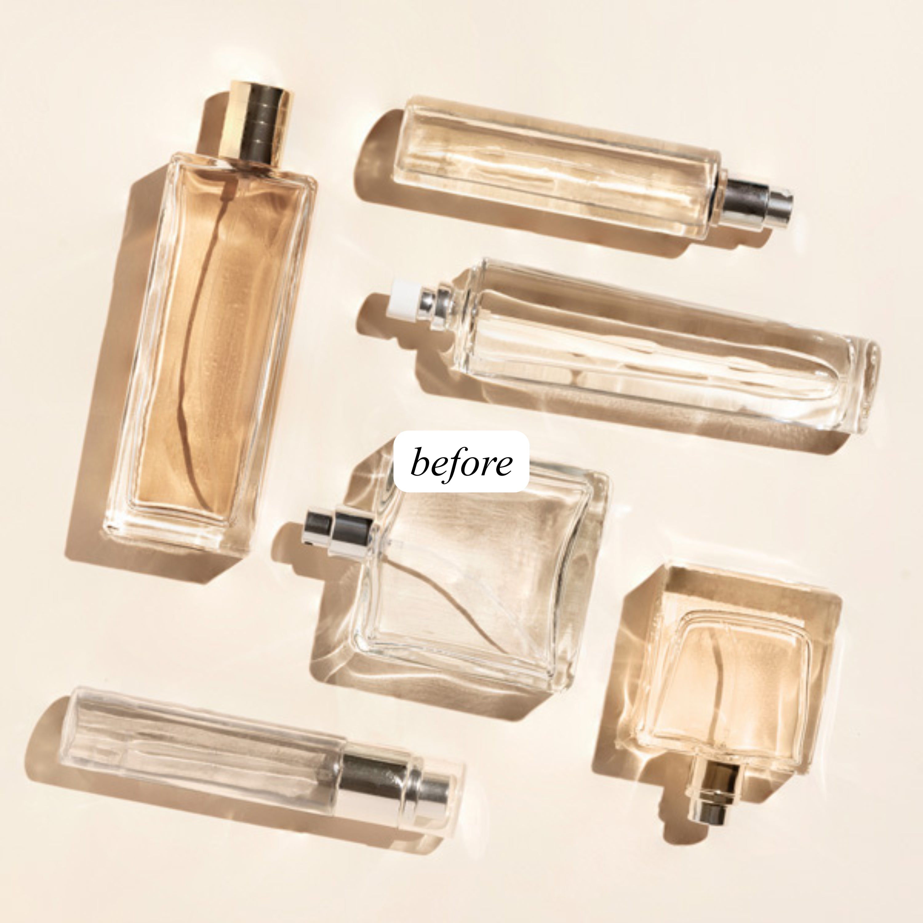 Fragrance photography still life with various perfume bottles on plain off white background