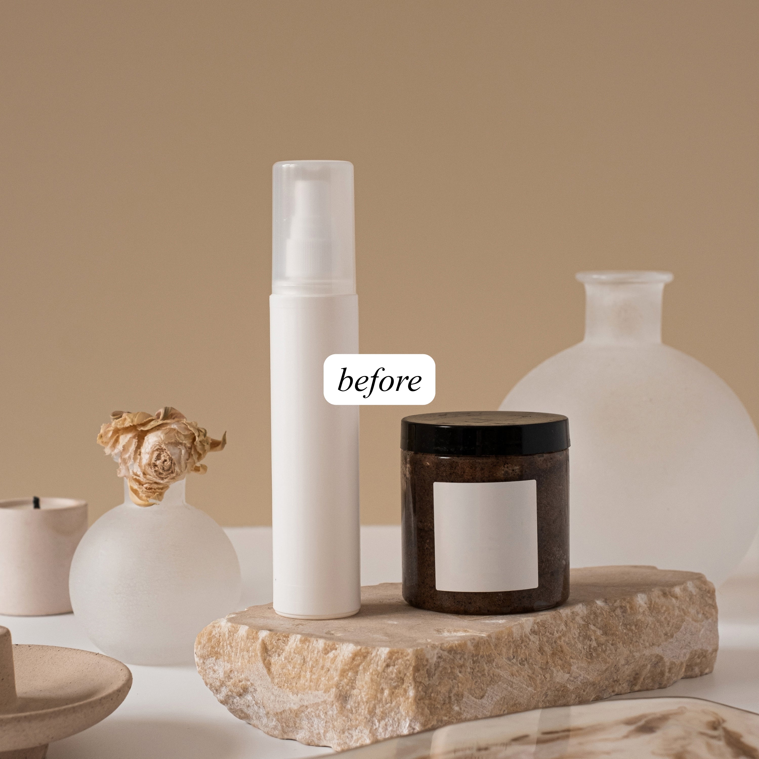 Beauty still life photograph of cosmetic bottle and jar on a stone surface with a smooth beige background 
